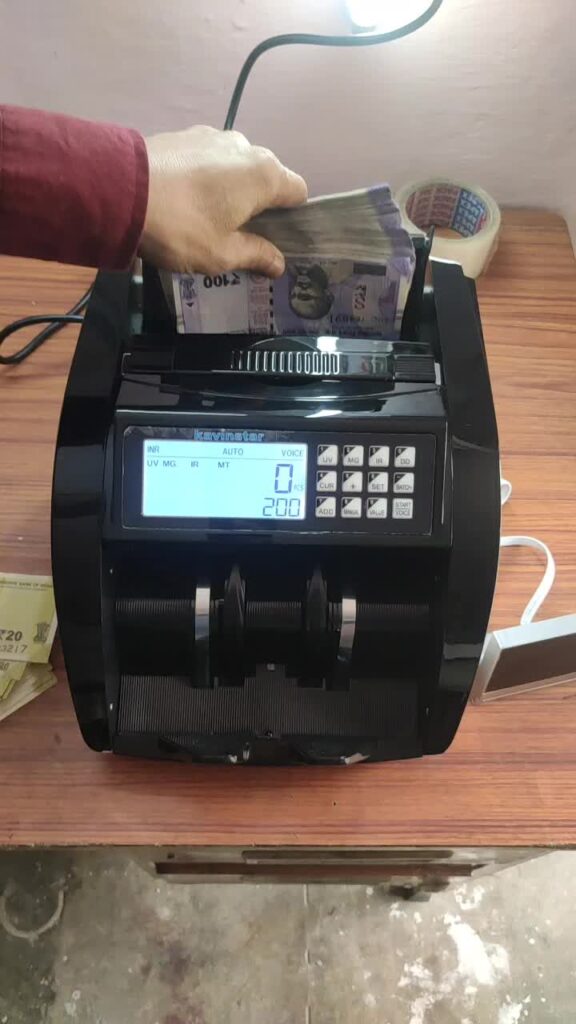 Cash Counting Machine with Fake Note Detector